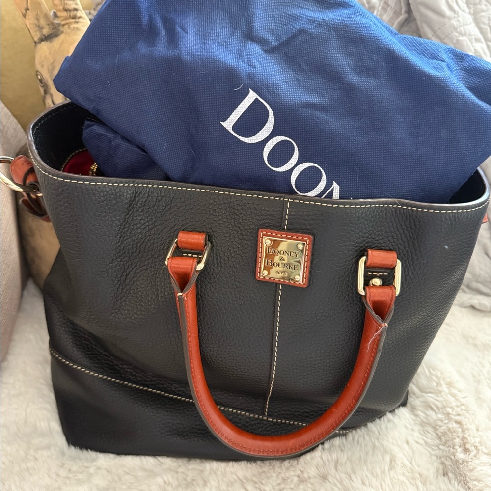 Dooney & Bourke Black Chelsea Tote with Brown Handles. Authenticity card.